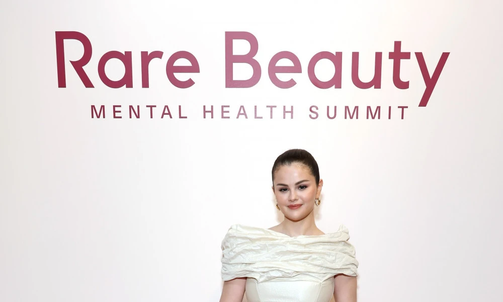 1 Rare Beauty_ The $2.7 Billion Beauty Brand That Proved Mental Health Can Drive Sales Selena Gomez presenting at the official Rare Beauty Mental Health Summit corporate event by BrandClickX