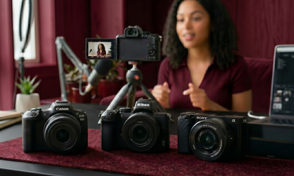 | Canon vs Nikon vs Sony: Best Camera Brand for Beginners & Pros (2026) Lineup comparison of the best budget mirrorless cameras from Canon Nikon and Sony for beginners and vloggers