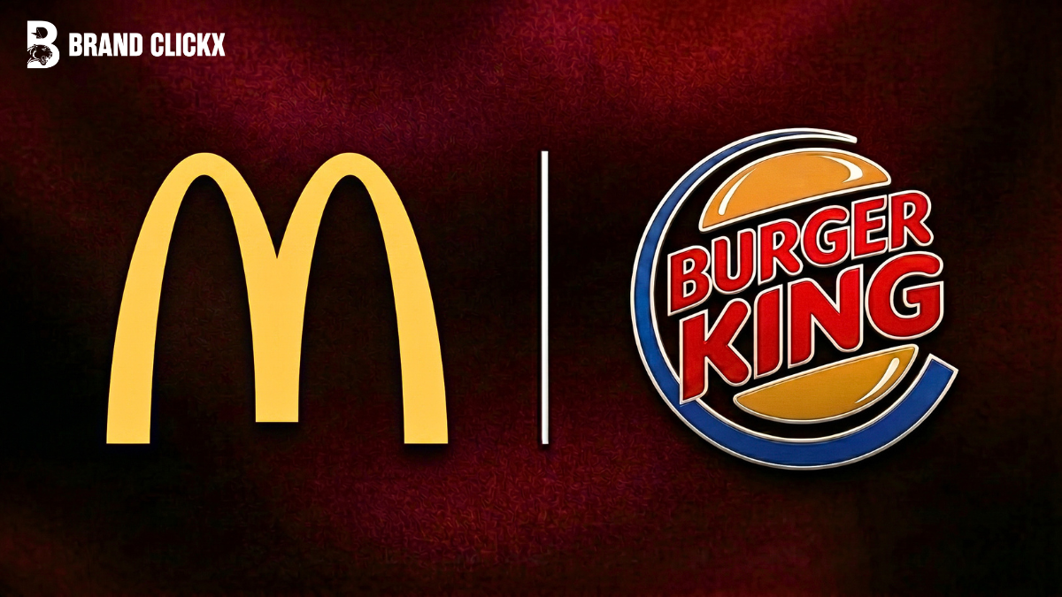 Feature – Mcdonalds – Burger King McDonalds vs Burger King fast food corporate brand logos side by side on a premium textured dark maroon background