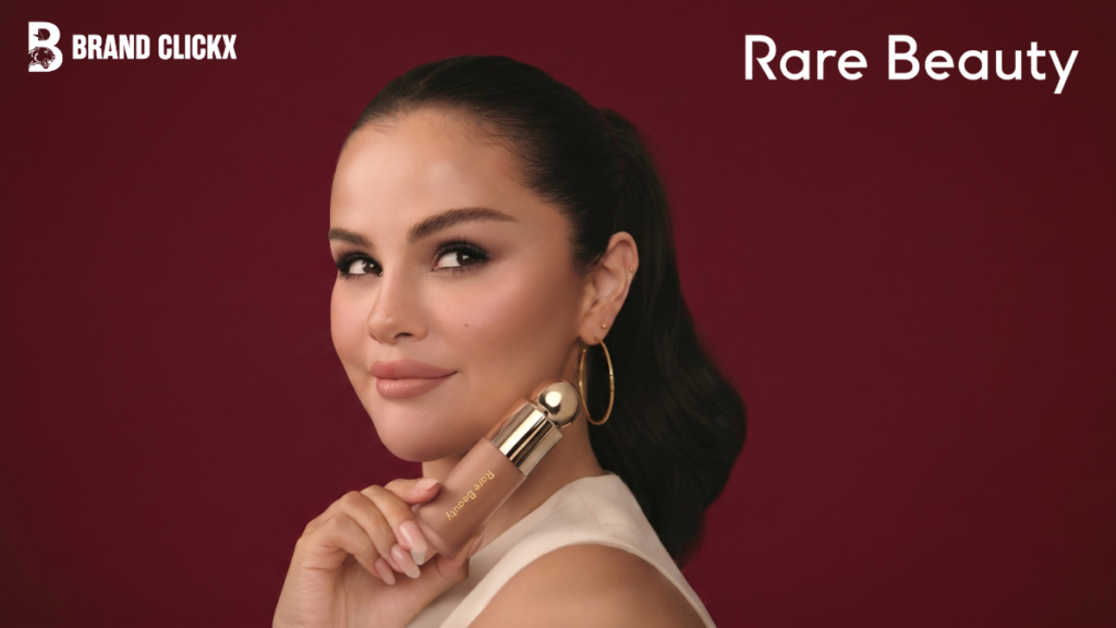 Selena Selena Gomez posing with a gold-capped foundation bottle for Rare Beauty on a premium deep red background by BrandClickX