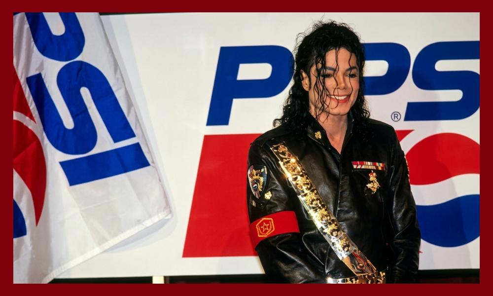 | Coca-Cola vs. Pepsi: 100 Years of Brand War — Who's Winning the Digital Era? Pop star Michael Jackson posing during the iconic 1984 New Generation Pepsi endorsement campaign