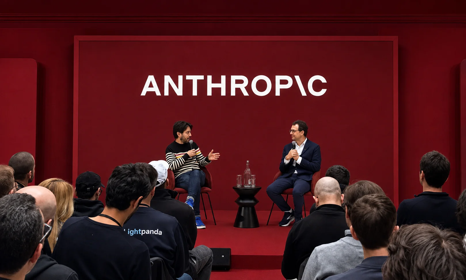 Anthropic AI company overview featuring corporate leadership against a dark red background