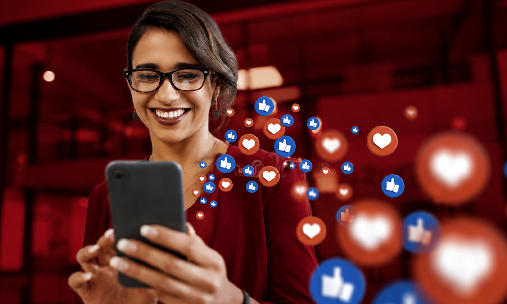 Smiling woman overwhelmed by floating icons of different social platforms