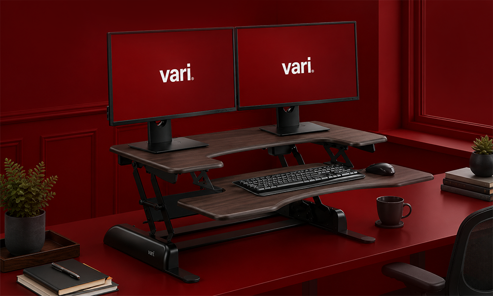 Vari standing desk converter with dual monitor setup
