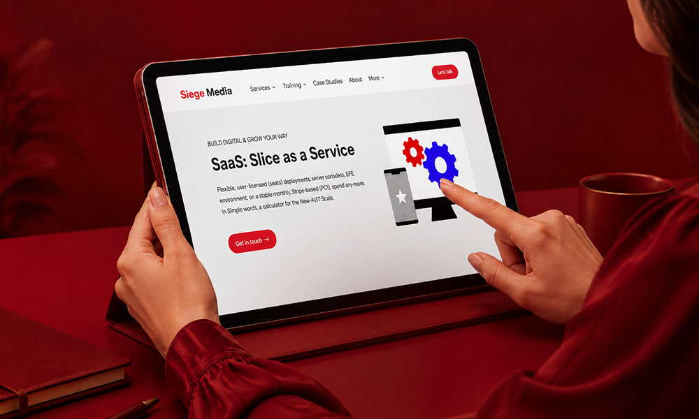 Hands reviewing SaaS content marketing metrics on a tablet by Brand ClickX.