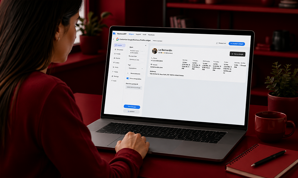 Person viewing an SEO client dashboard interface on a laptop screen.