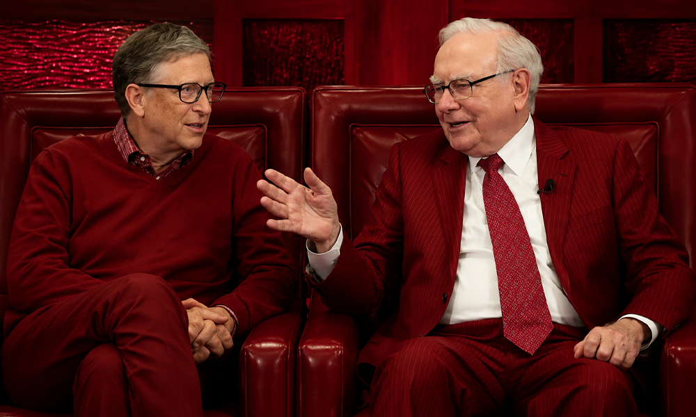 | Warren Buffett Drops Gates Foundation From Annual Donations for First Time in 20 Years Bill Gates and Warren Buffett sitting together both wearing red suits.
