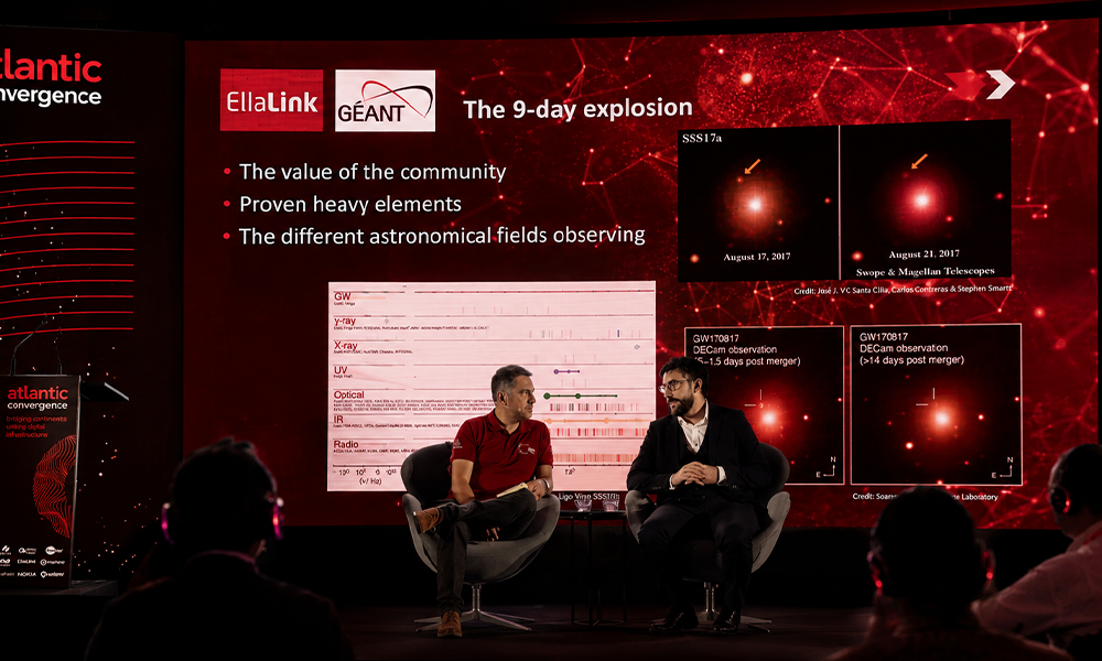 Two professionals participating in a panel discussion at an event.