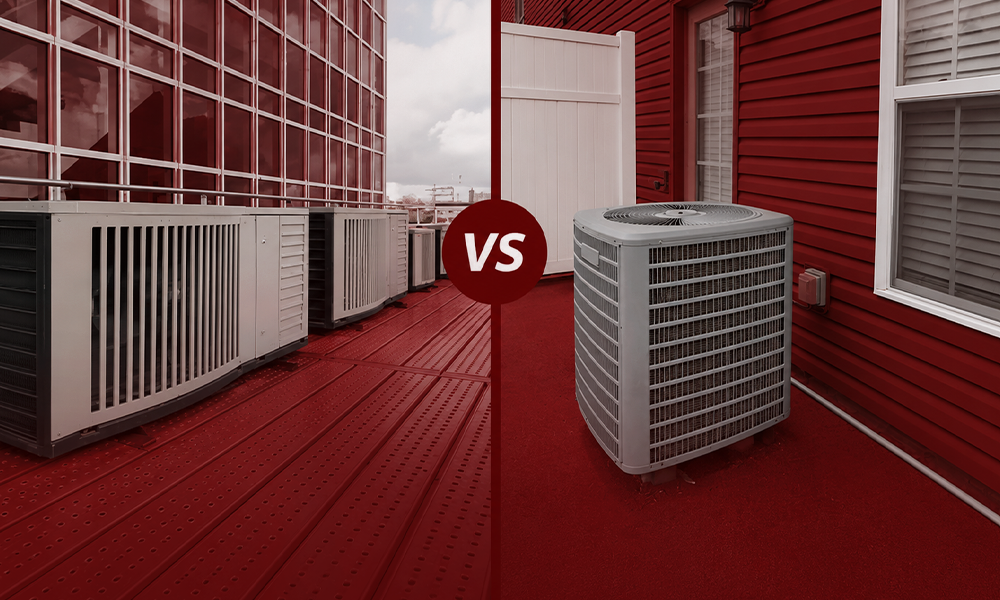 HVAC unit installed inside a room with red-toned walls.
