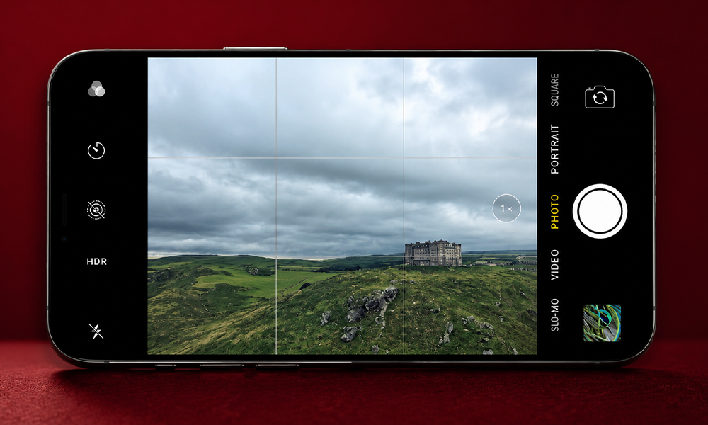 | Hidden iPhone Camera Tricks You Should Start Using Right Now Smartphone screen showing a camera focus shot of small decorative items.