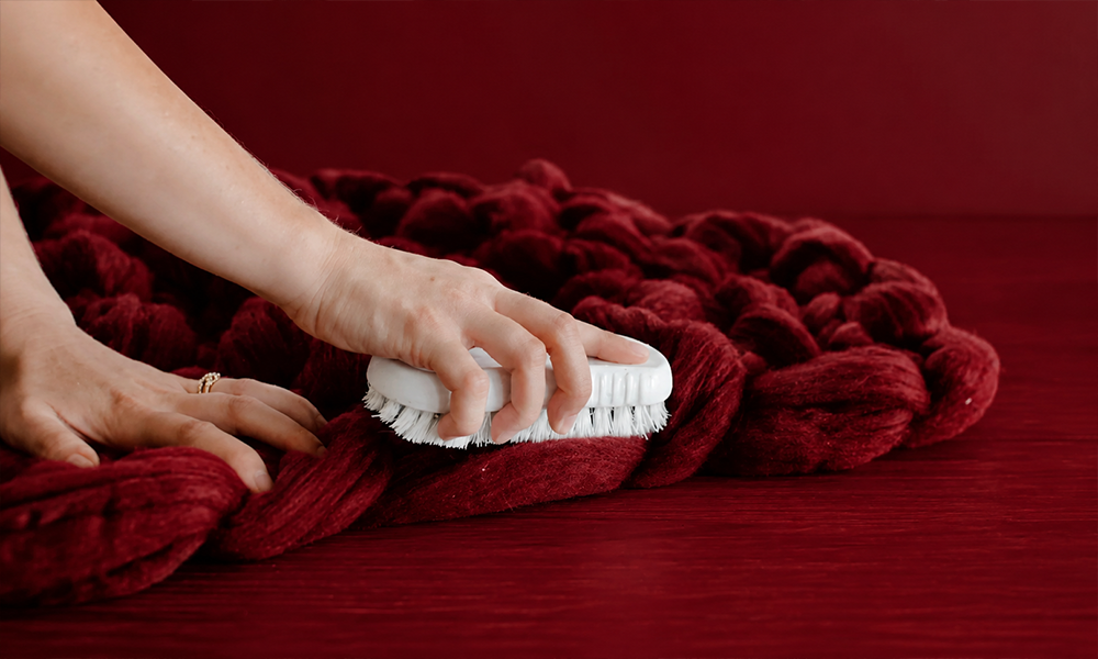 | How to Wash a Wool Blanket Without Shrinking It: Step-by-Step Cleaning & Care Guide Professional studio setup of various cleaning products.
