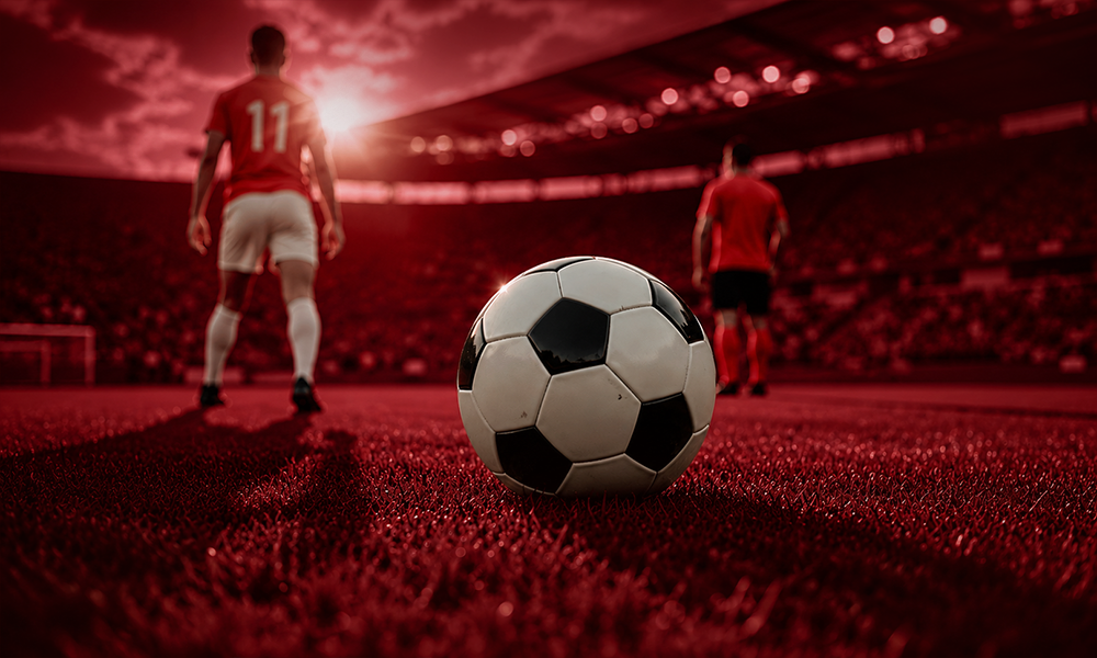 Football ball on a stadium pitch by Brand ClickX.