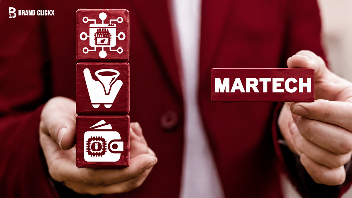 Person holding a block with MARTECH text next to stacked blocks featuring marketing technology icons
