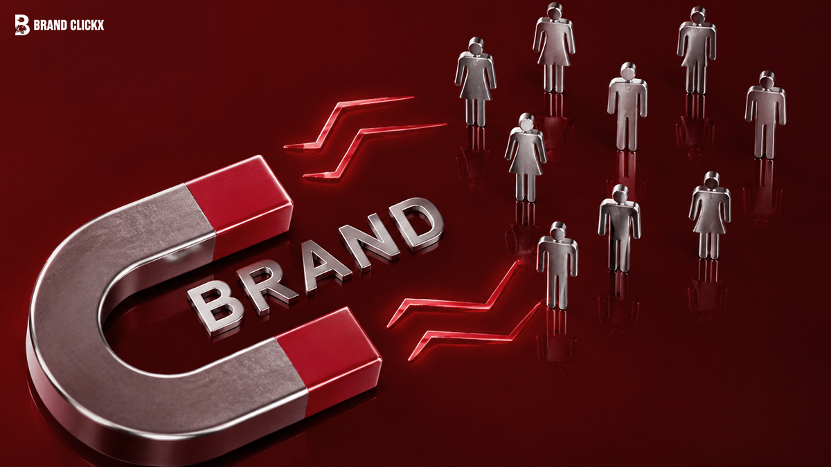Large horseshoe magnet with BRAND text attracting metallic human figures on a red surface