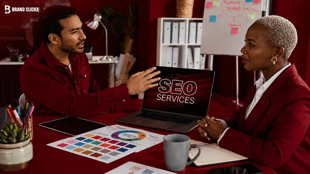 Colleagues discussing SEO services during a professional meeting.