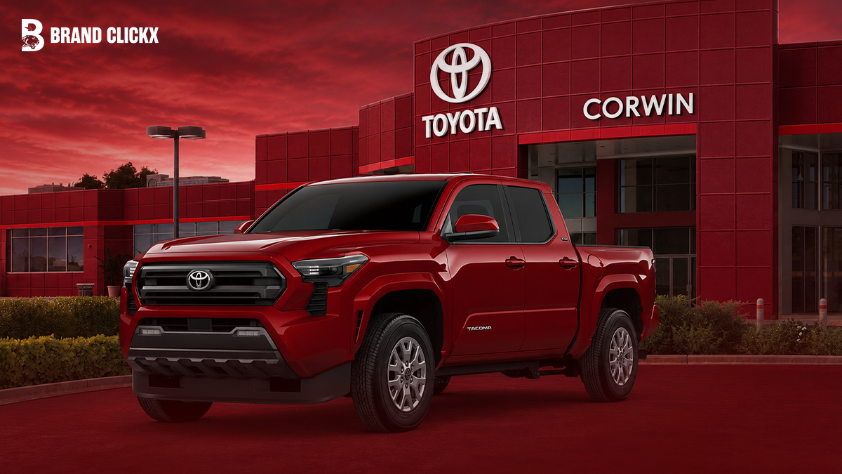 red-pickup-truck-exterior-view.png A red pickup truck parked outside a building, exterior view.