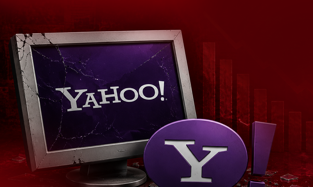 | 5 Biggest Tech Brand Failures That Shaped Industry Standards Cracked monitor displaying the Yahoo logo on a red background.