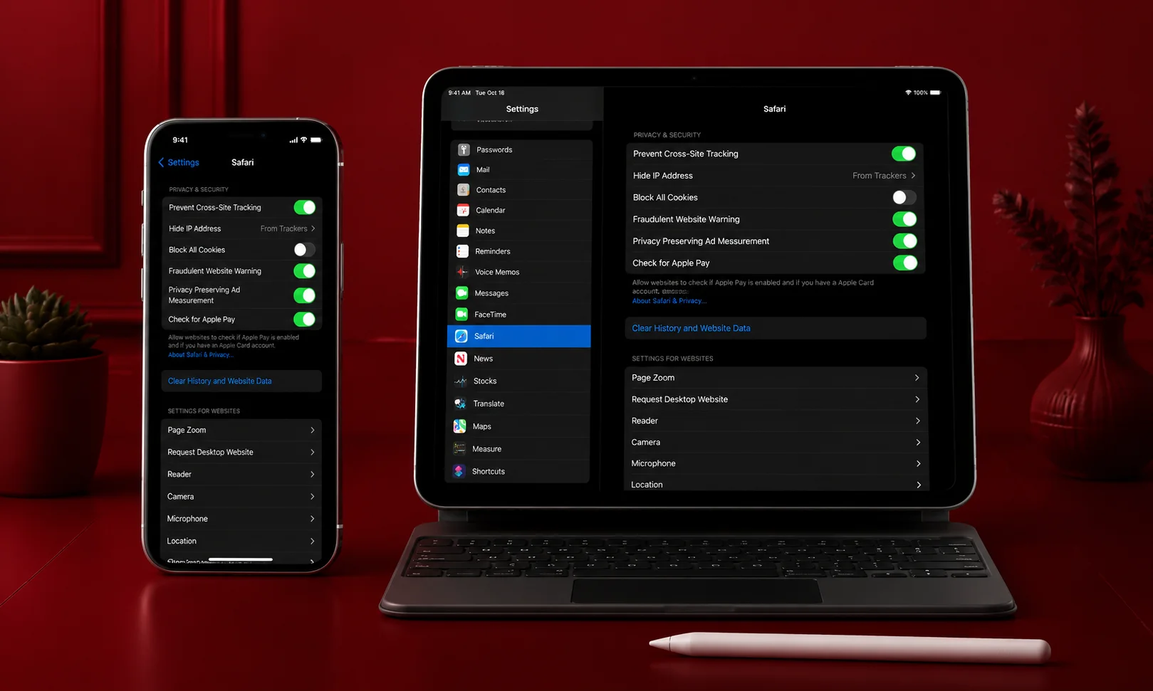 An iPhone and laptop displaying cache clearing options on a red desk