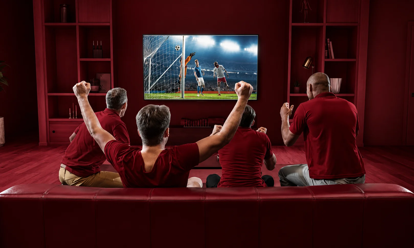 Group watching live sports together on a TV