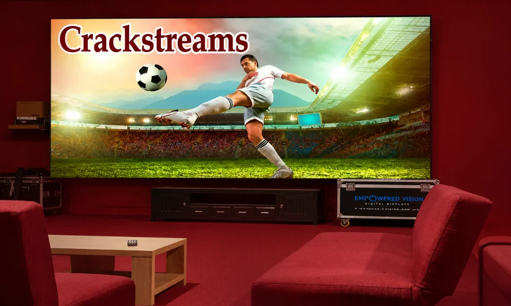 A room setup featuring a television screen playing a sports match under a warm red ambiance.