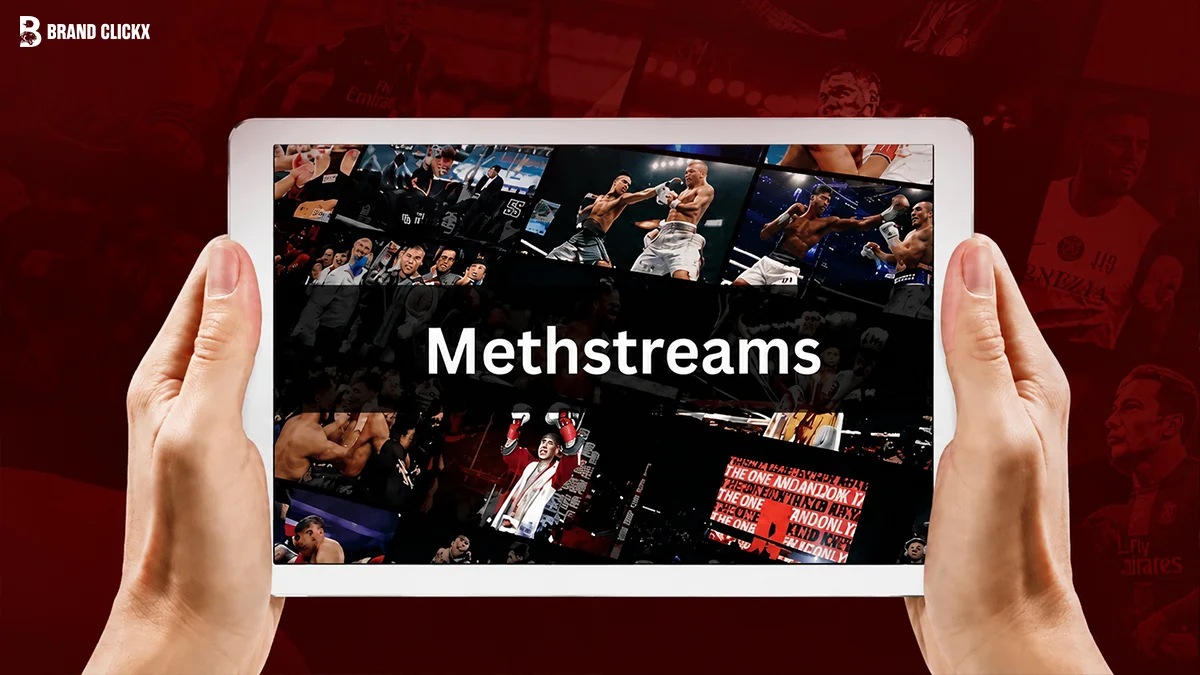 MethStreams What Happened Hands holding a tablet showing a sports streaming interface in a red-lit room