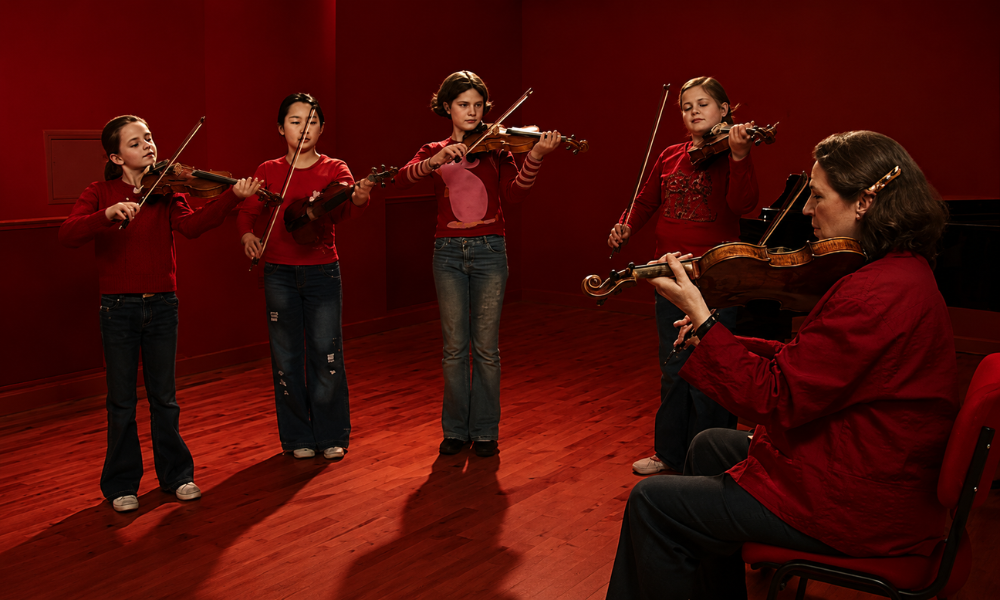 Professional violinist playing instrument for practice
