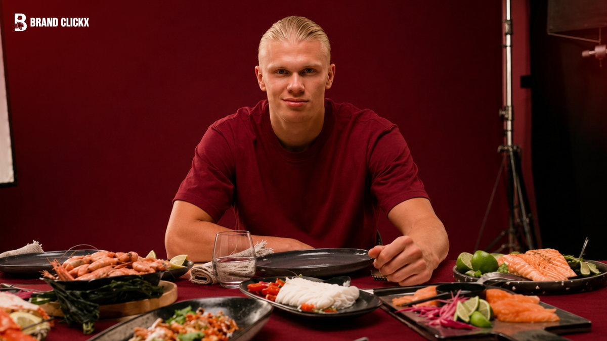 Person sitting at a table with food in a red-themed room