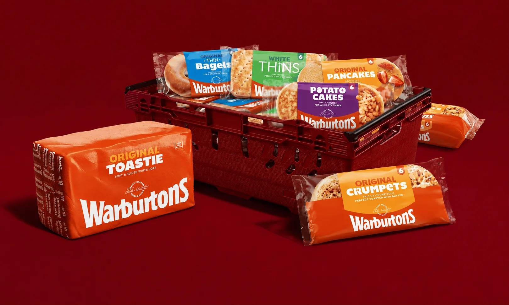 Warburtons 150th anniversary packaging on a red-themed display surface