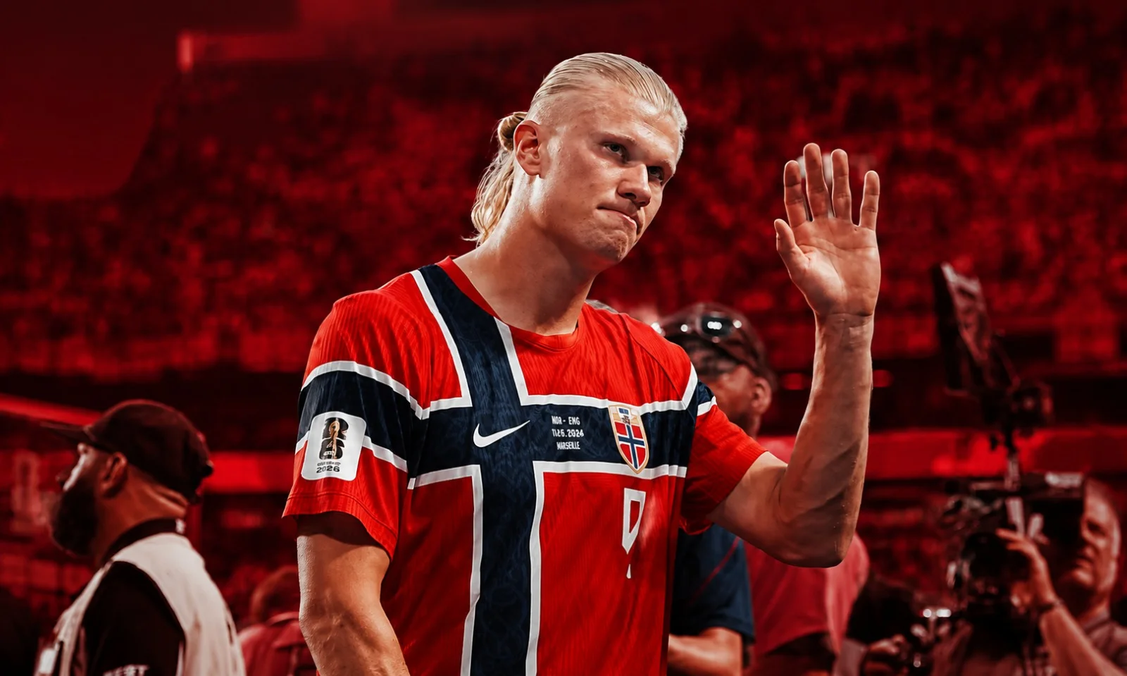 | Messi vs Haaland vs Ronaldo: The Real Numbers After the 2026 World Cup Erling Haaland waving in a red-lit stadium environment