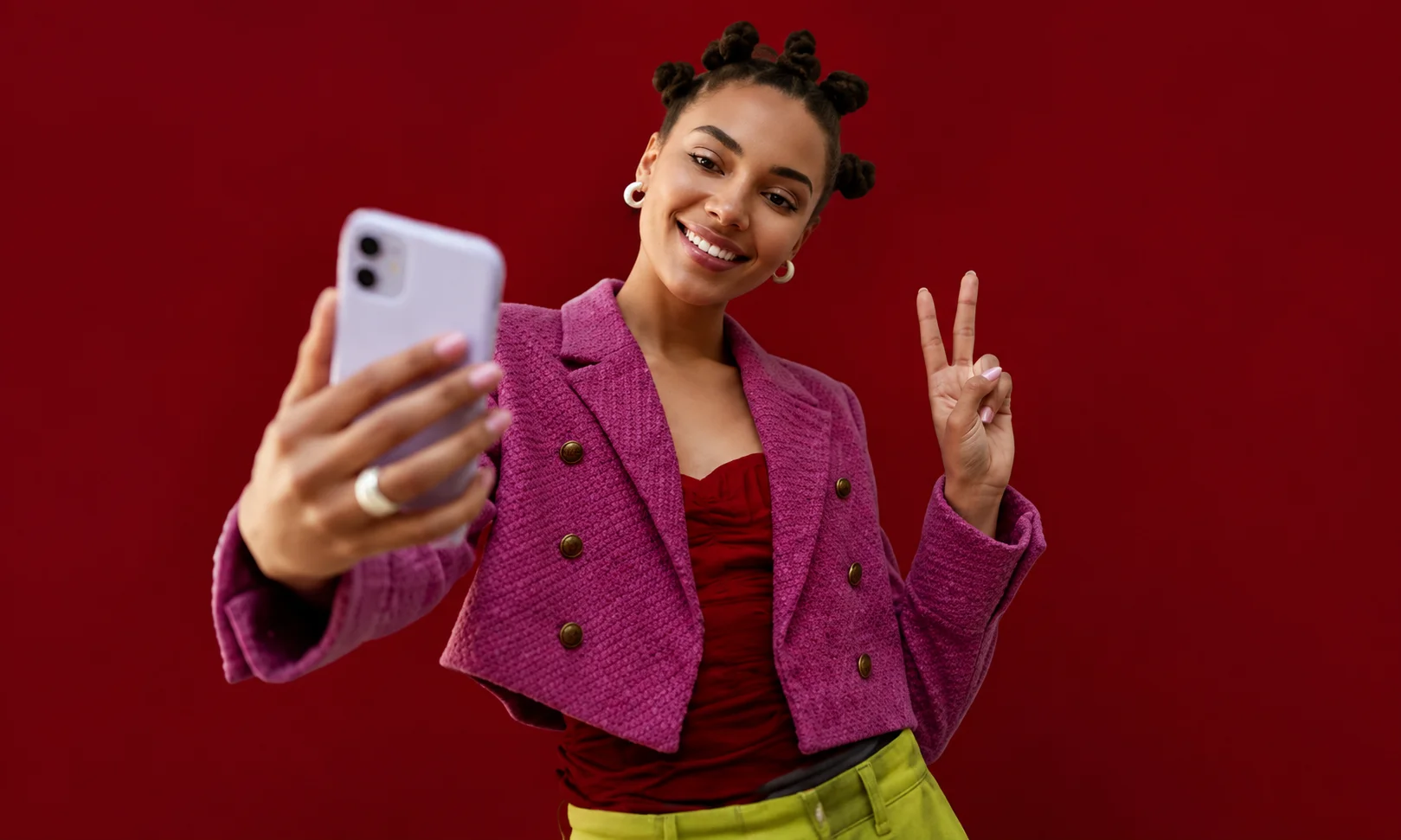 Modern influencer collaboration approaches set against a dark red backdrop