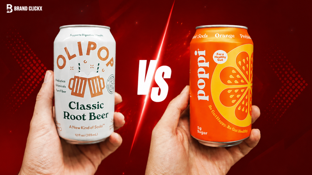 poppi-vs-olipop-prebiotic-soda-comparison Two hands holding a can of Olipop Classic Root Beer and Poppi Orange soda side by side with a red VS background