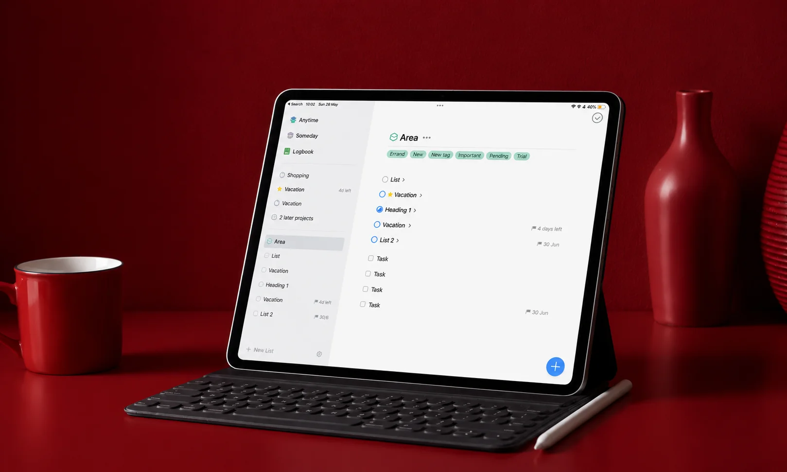 Things 3 task management app displayed on a mobile device under rich red lighting