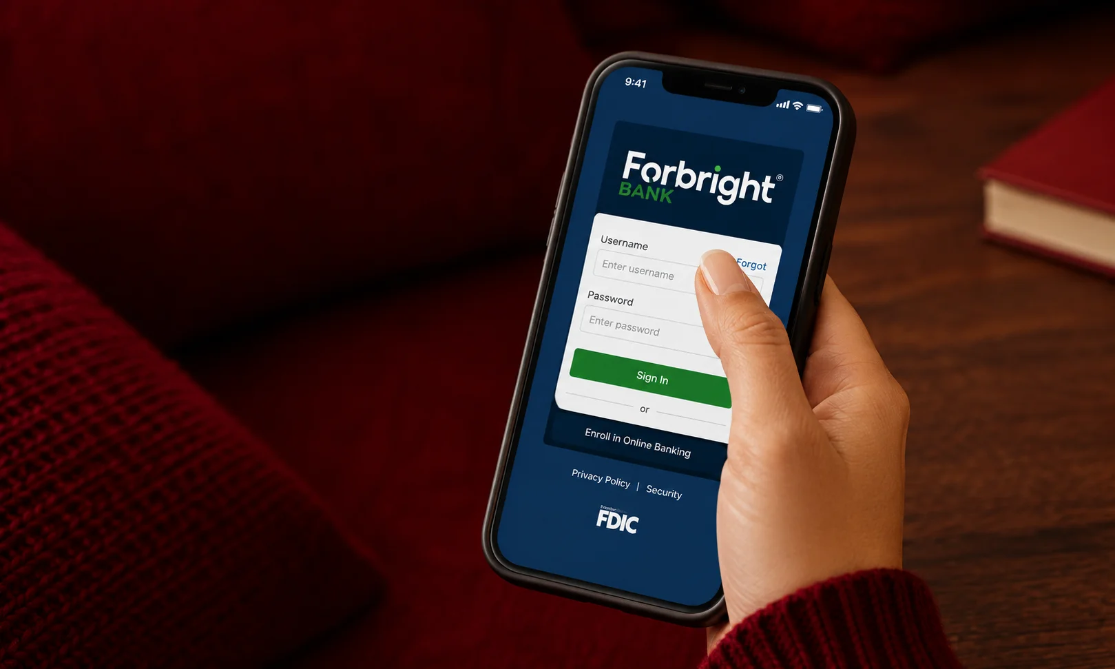 | 15 Best High-Yield Savings Accounts of August 2026 (Up to 4.21% APY) A person holding a smartphone showing Forbright Bank's mobile platform.