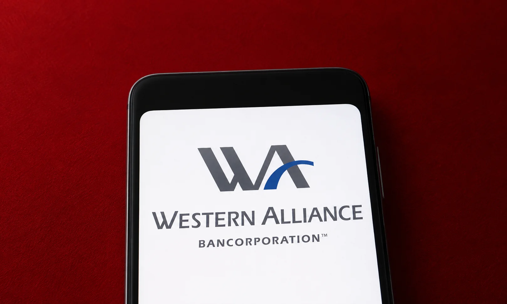 | 15 Best High-Yield Savings Accounts of August 2026 (Up to 4.21% APY) A smartphone displaying Western Alliance Bank's digital banking interface.
