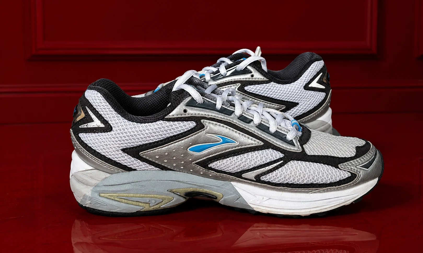 Brooks athletic shoes engineered for natural biomechanical support and long-distance road running.