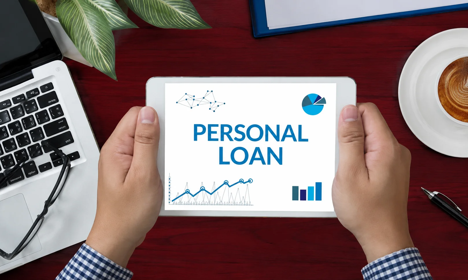 | Best Egg: Personal Loans & Financial Services 2026 Person holding a tablet displaying personal loan information with charts, laptop, and coffee cup on a desk