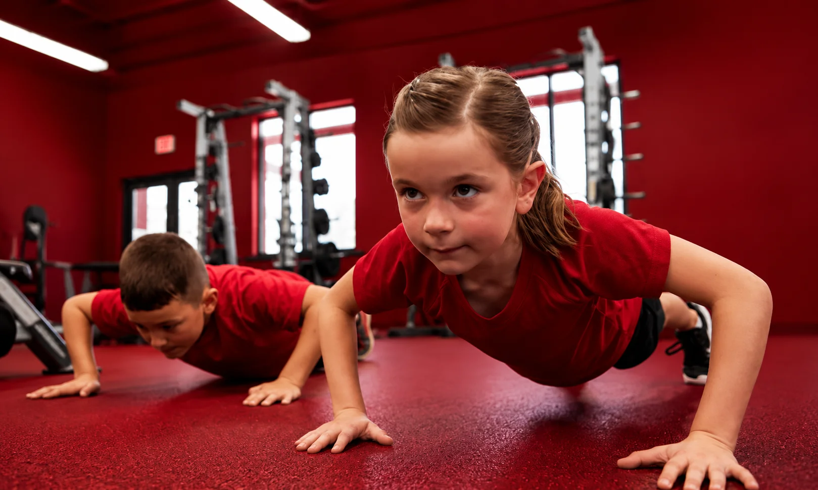 Children engaging in active outdoor play and bodyweight exercises for kids fitness