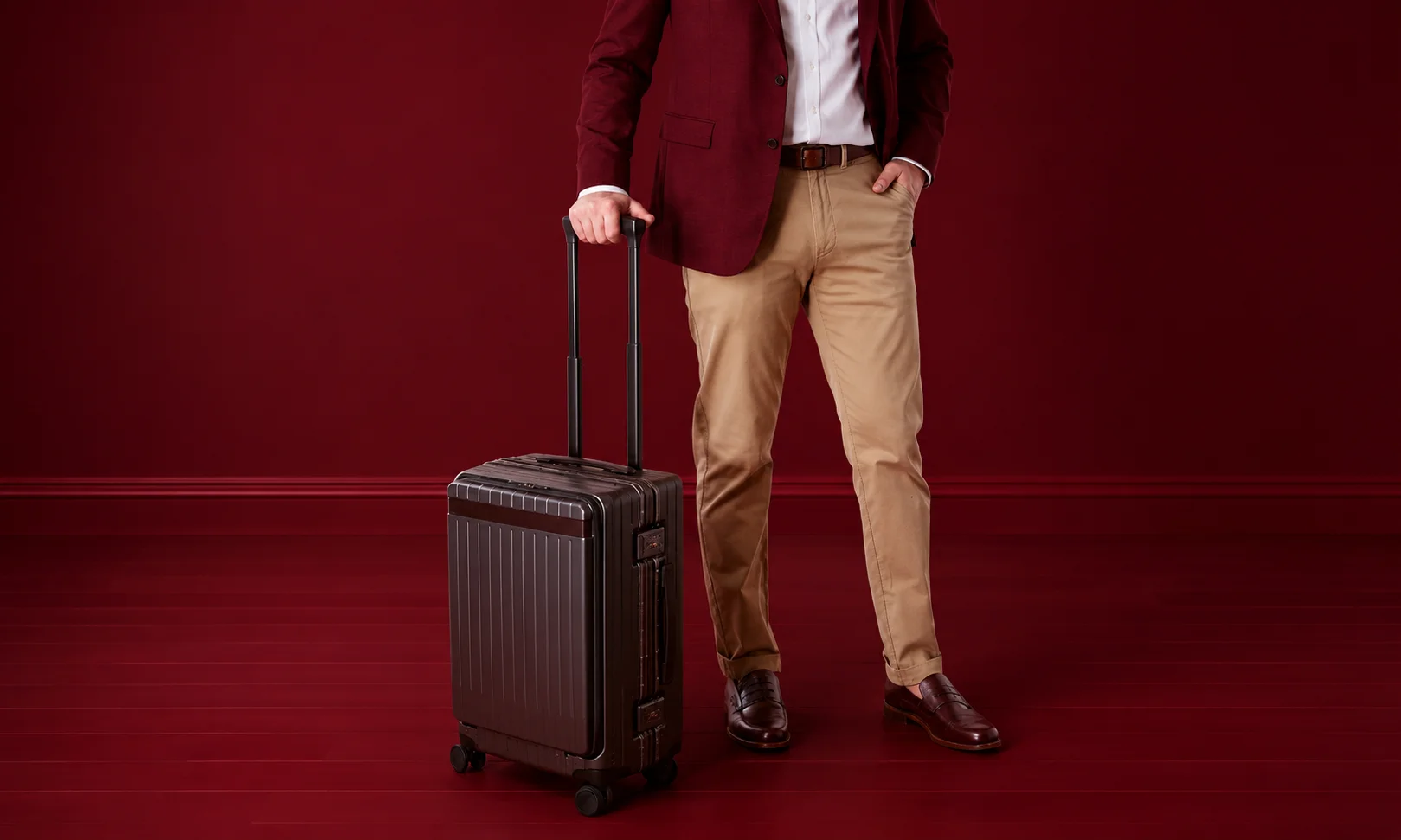 | 15 Best Luxury Luggage Brands for Travelers in 2026 Leather-accented Carl Friedrik suitcases in a professional display.