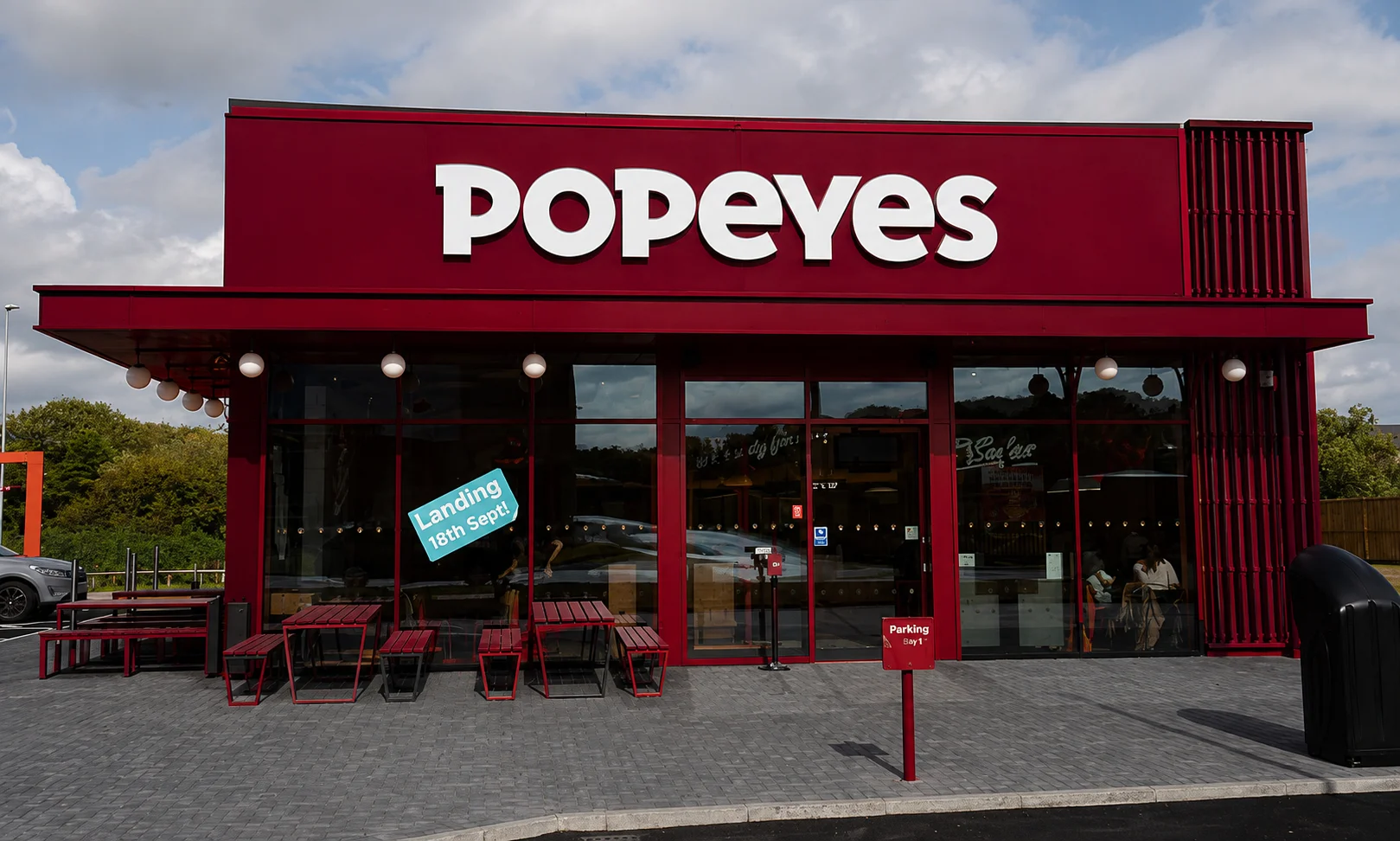 Popeyes fast food restaurant exterior storefront