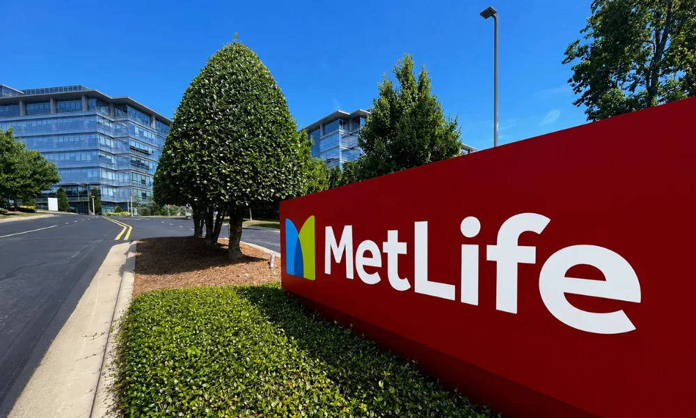 | Best Insurance Companies in the World in 2026 A large red sign featuring the MetLife insurance company logo and branding outside a corporate office building.