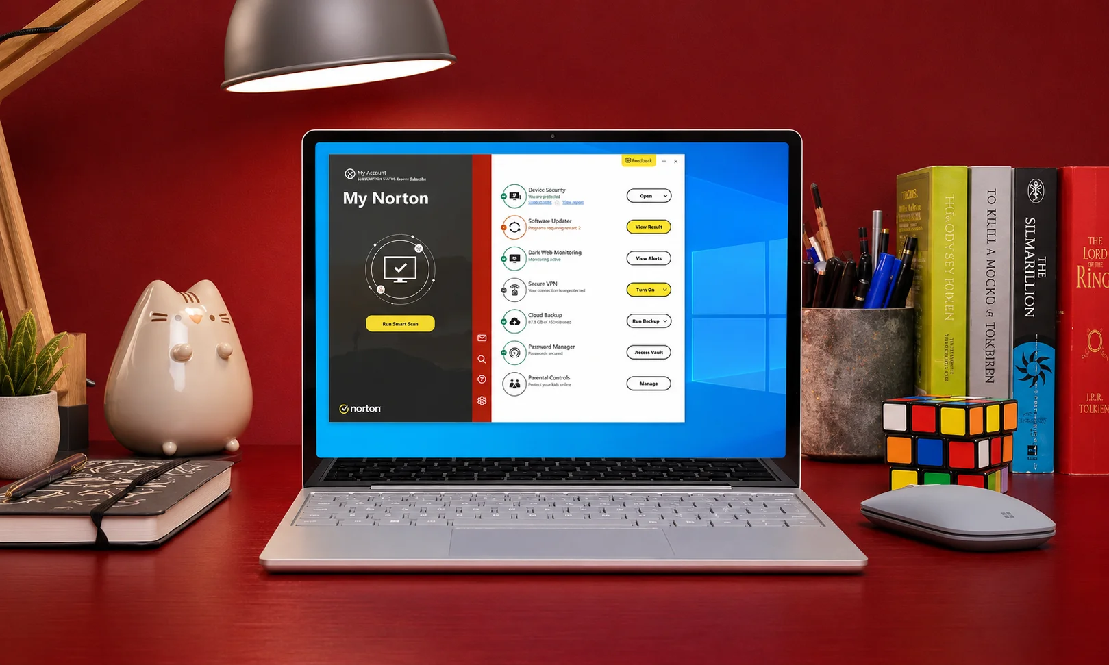 | Best Antivirus Software of 2026: Expert-Tested Picks for Every Need Norton 360 antivirus software interface displayed on a laptop against a red background
