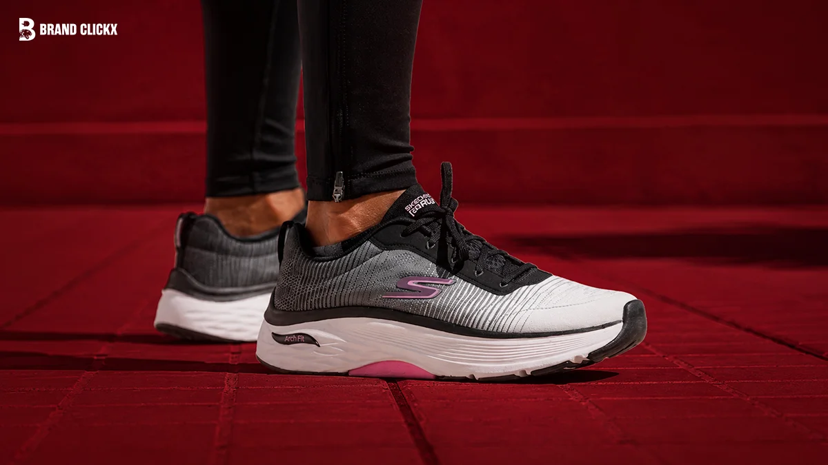 Skechers sneakers displayed on red background