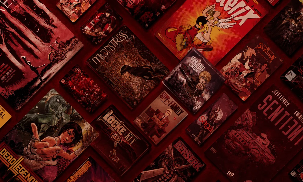 Assorted comic book covers arranged neatly on a rich dark red surface