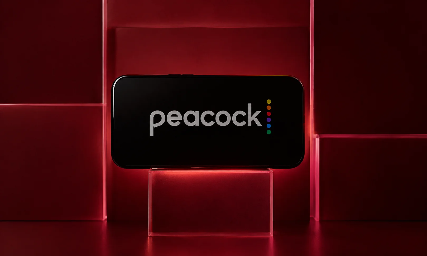 | StreamEast NFL: What Happened & How to Watch in 2026 A graphic displaying the Peacock logo set against a red-toned technological environment.