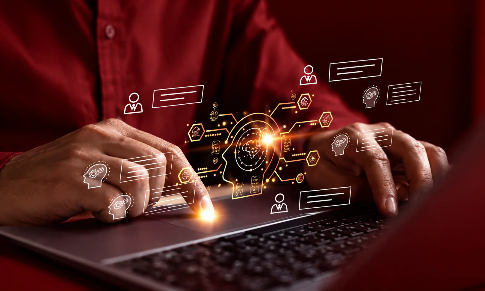 Close-up of hands typing on a laptop with digital data overlays representing enterprise knowledge management and AI tools.