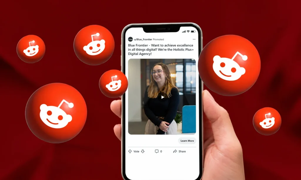 Smartphone displaying a Reddit promoted post surrounded by Reddit logos on a red background.